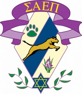 Crest with the Greek Letters Sigma Alpha Epsilon Pi in the a purple ribbon with a lioness, paw, iris and Star of David in a blue and yellow diamond. 